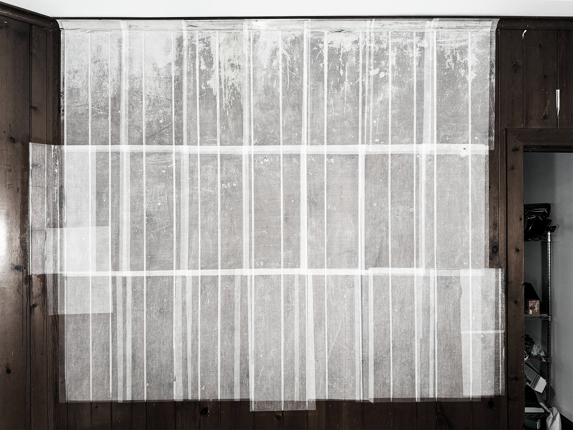 paper lamination of a piece of wall in my home in New Haven